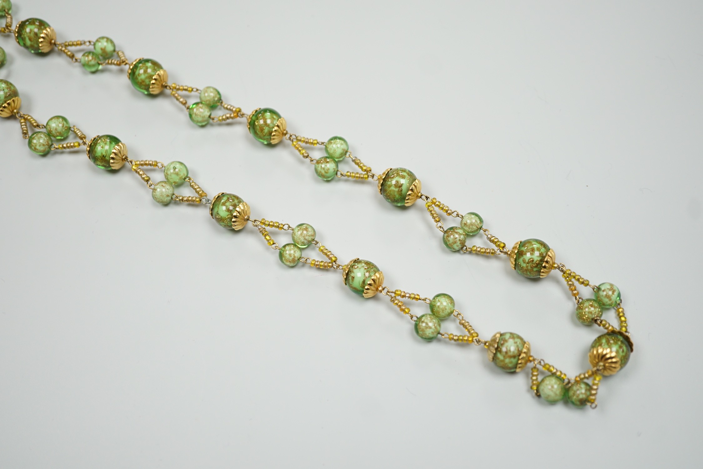 A late 20th century gilt metal and Murano glass bead set necklace, 74cm.